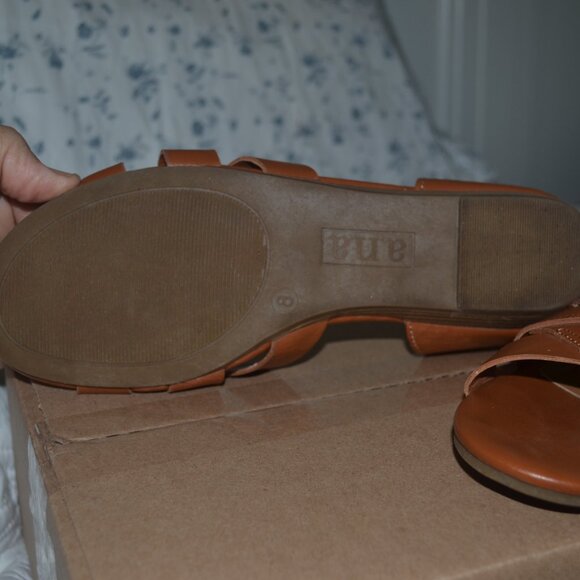 Pre-owned pair of A.N.A. cognac color flat sandals. Criss-cross straps, size 8 m - Picture 7 of 8